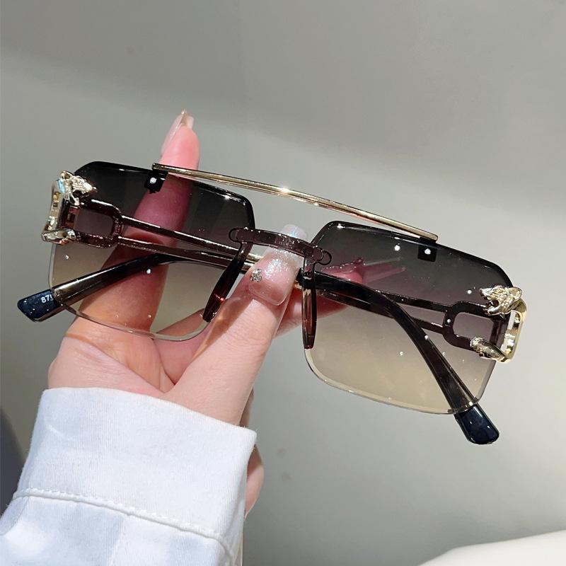 Men'S Handsome Fashion Leopard Head Trimmed Frameless Ocean Sheet Sunglasses Light Luxury Double Beam Driving Sunscreen Sunglasses