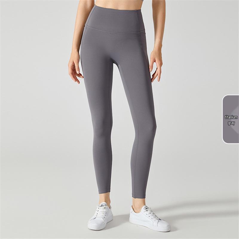 

Fleece-Lined Yoga Pants for Autumn/Winter - Women s Warm, Thick Fitness Leggings with Pockets and Peach Hip Design. L