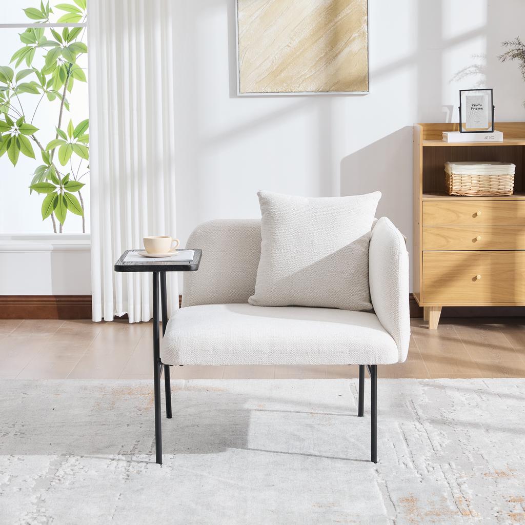 Poltrona individual moderna com encosto de tecido confortável e dois compartimentos de arrumação, complementada por uma mesa lateral prática.