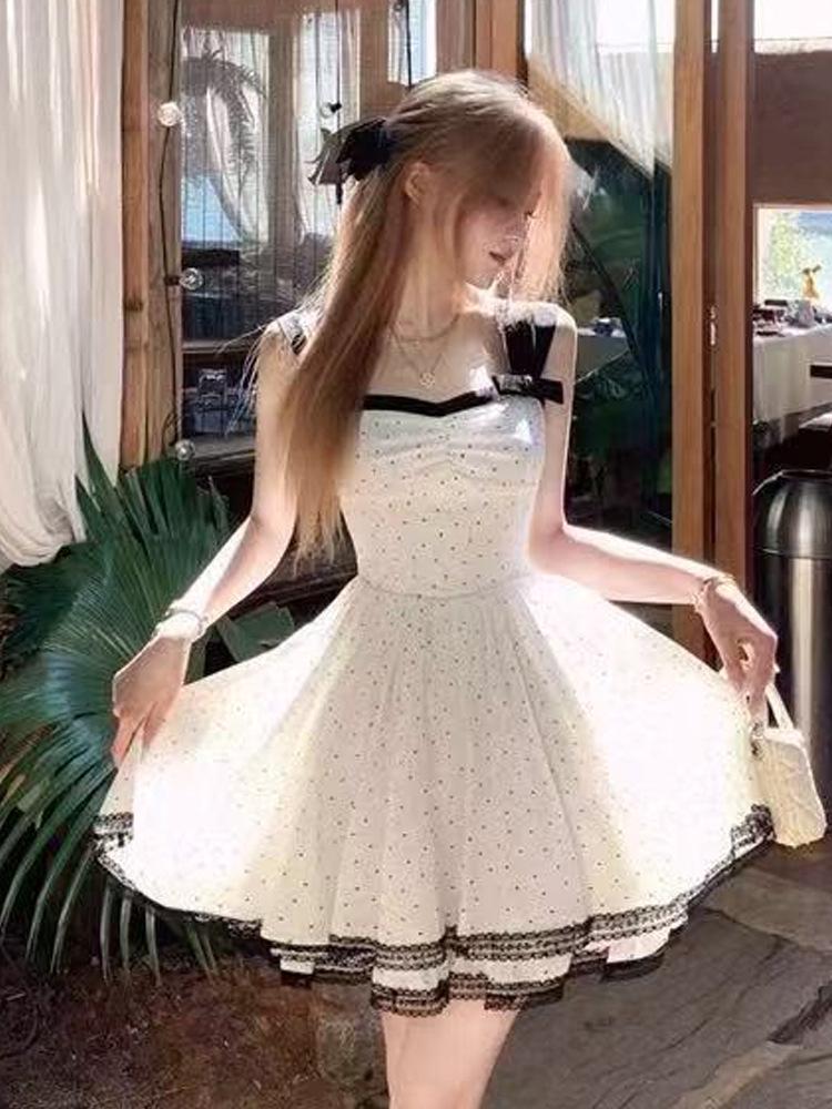 Women's French Retro Polka Dot Spaghetti Strap Dress - Elegant Summer Style with Waist-Cinch and Long, Slimming Hem