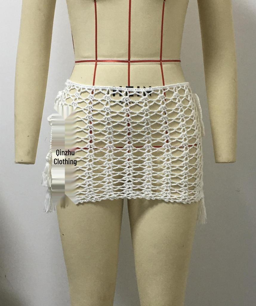 Dámská mini bodycon sukně z prodyšné síťoviny s průstřihy pro plážovou dovolenou