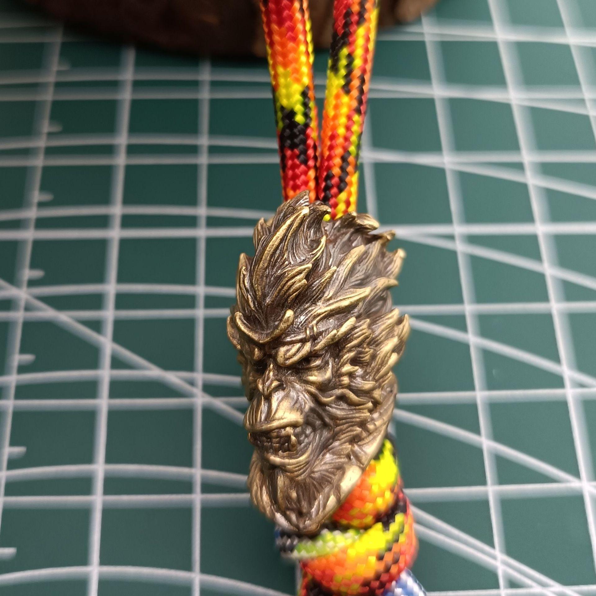 Chinese Style Dark Goku EDC Pendant: Handmade Paracord Keychain with Auspicious Pattern. латунный