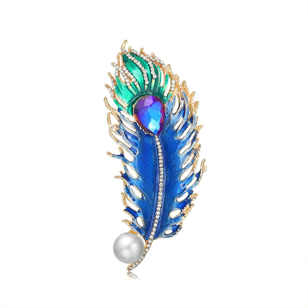

Peacock Feather Brooch With Resin Dipped Oil Geometric Design For Fashion Accessories