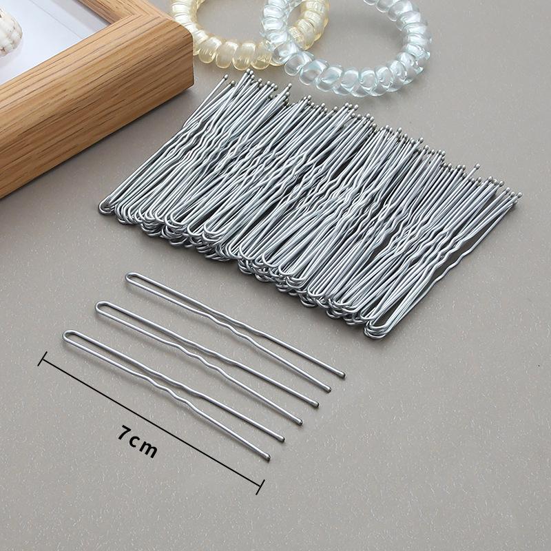 

Черная шпилька-зажим из стали для укладки прямых челок и густых волос