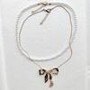 European & American Summer Fashion: Layered Alloy Bow Tie Necklace with Faux Pearl.
