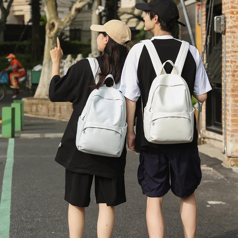 School bag 2025 new solid color simple backpack college student Korean version school bag versatile simple casual fashion backpack