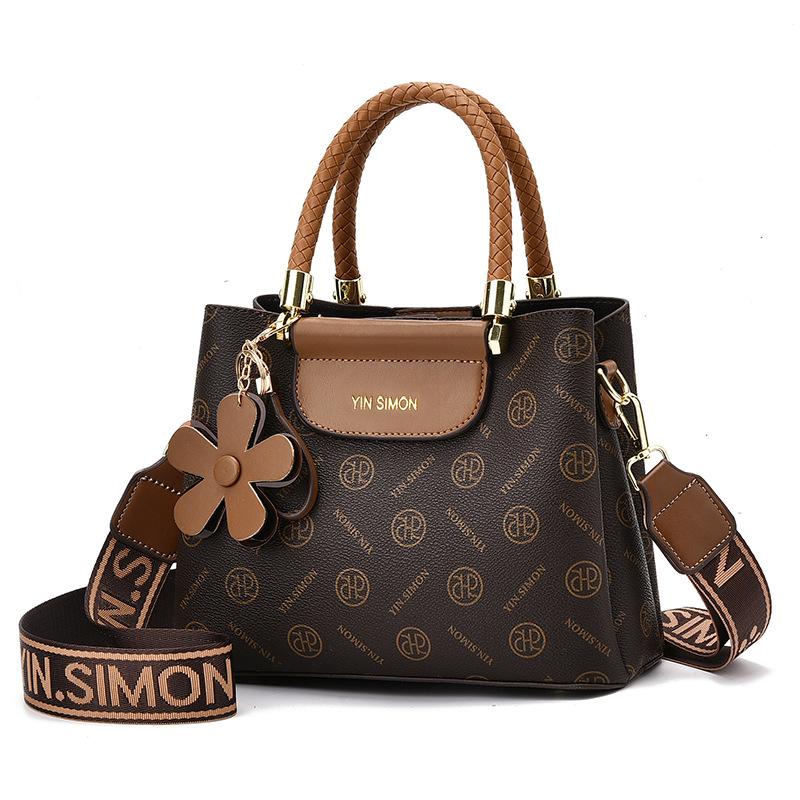 Hinkväska dam 2025 ny höst- och vintermode axelväska sned axelväska blomväska handväska med stor kapacitet damväska tide