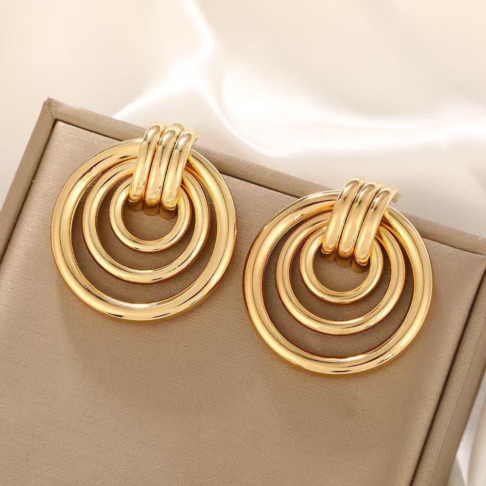 Europäisch-Amerikanische Geometrische Twist Kreis Ohrringe – Stilvoll, Mehrschichtig und Vielseitig