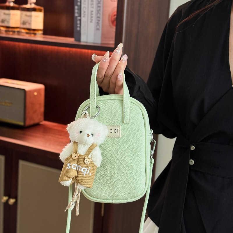 

Hand carry fashion mobile phone bag women s spring new trend versatile shoulder bag high sense messenger bag