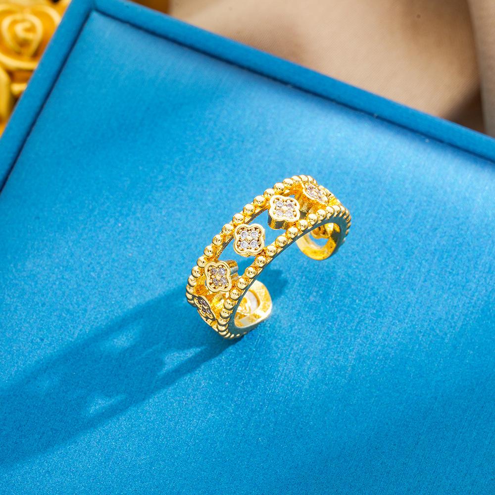 Vintage style diamond hollow out four leaf clover zircon open ring, with a niche design and personality
