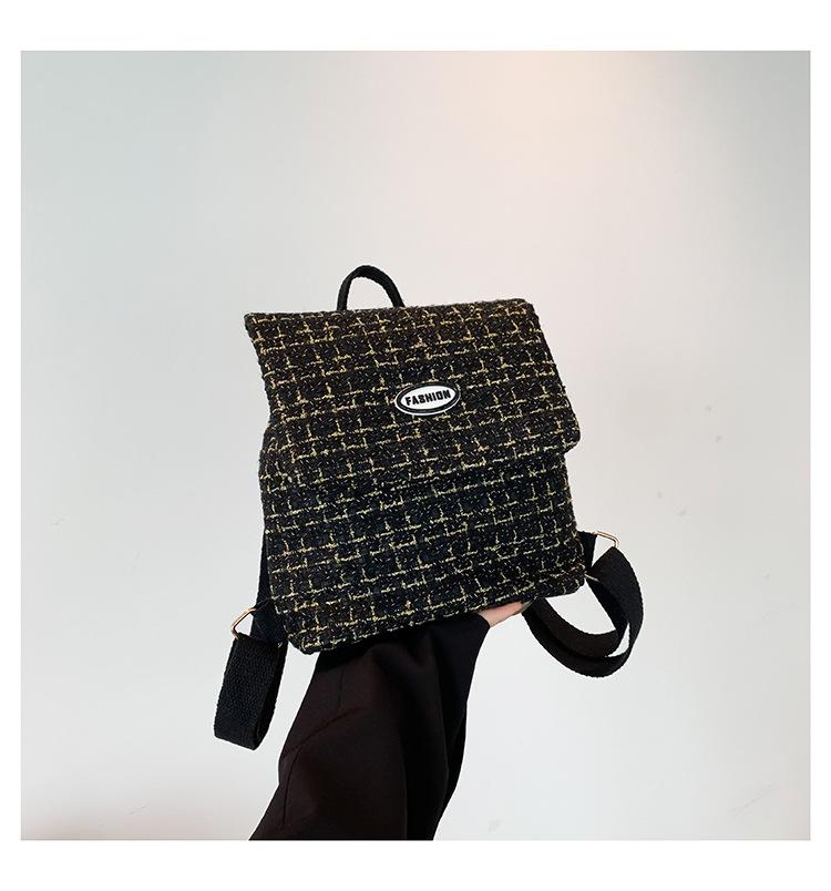 

Популярная новинка этого года 2024 года — корейская версия шерстяной клетчатой сумки-рюкзака большой вместимости в иностранном стиле чёрный