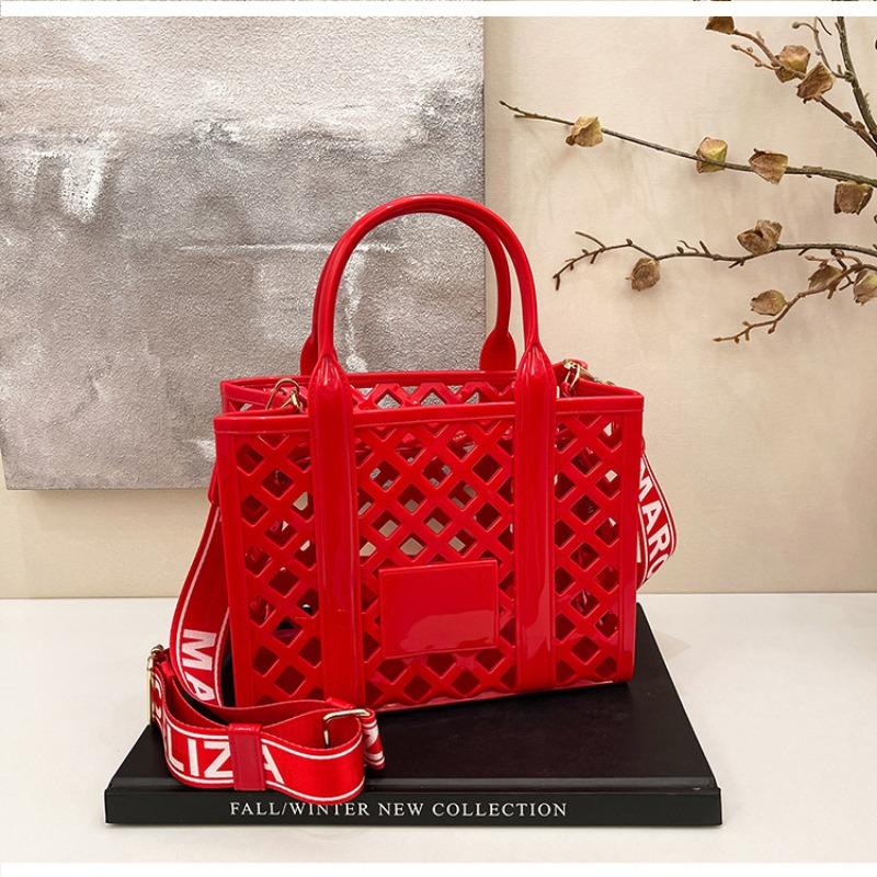 Mode Bonbonfarbe Strandtasche Damen neue personalisierte hohle Handtasche Nische Schultertasche Umhängetasche