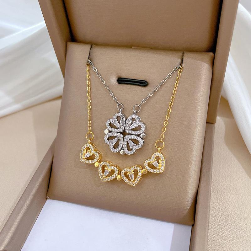Zircón nuevo dos collares magnéticos de amor trébol de cuatro hojas temperamento lujo ligero cadena de acero de titanio.