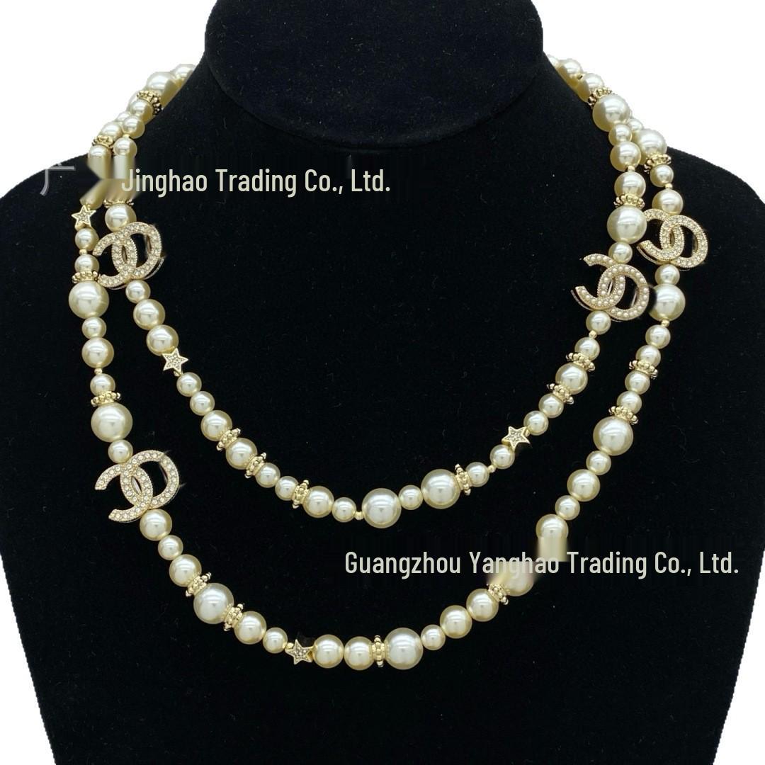 

Seiko Women s High-Quality Double C Diamond Star Pearl Sweater Necklace