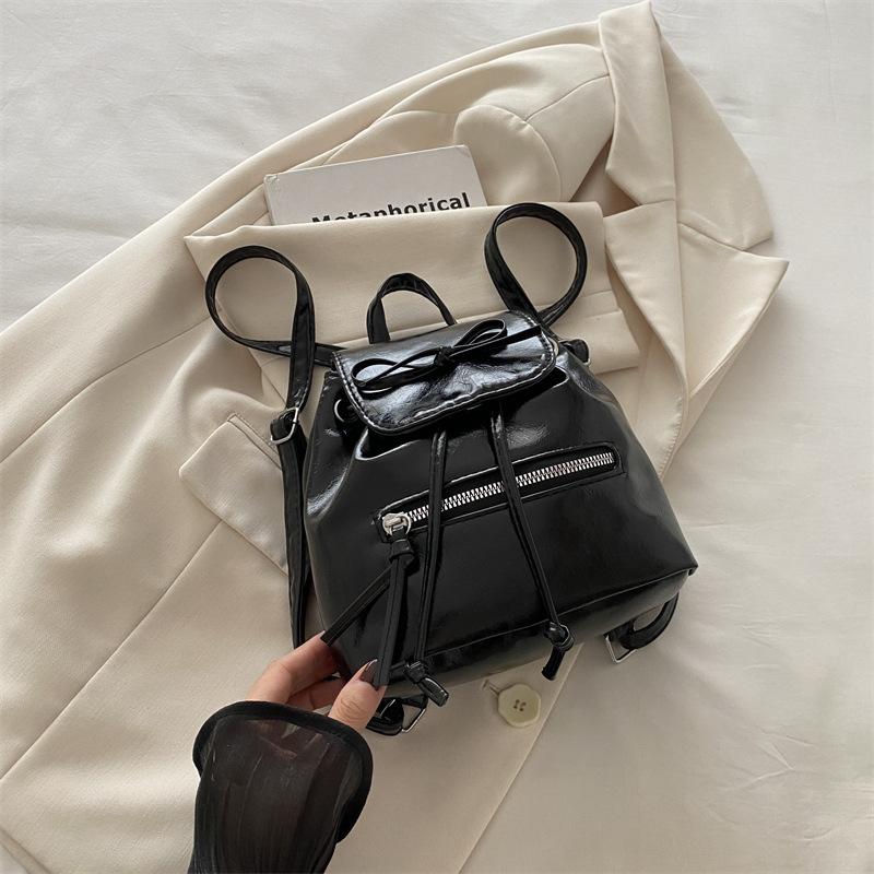 

Нишевый дизайн женский рюкзак 2025 осень новый бант шнурок универсальный студенческий маленький рюкзак