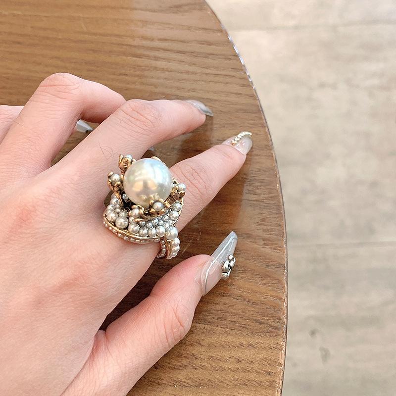 

Court style retro pearl flower ring ring light luxury heavy industry temperament jewelry