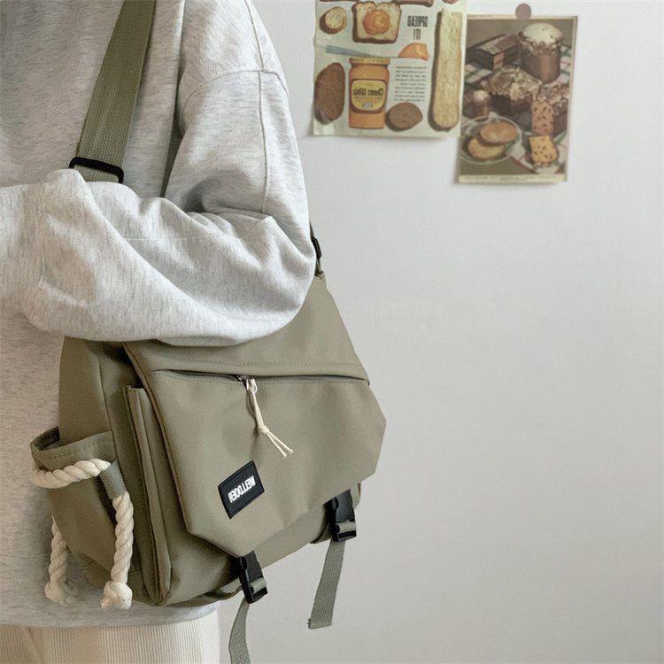 

Harajuku Workwear Crossbody Messenger Bag: Functional, Large-Capacity Shoulder Bag for Men and Women, Ideal for Commuting or College. зелёный