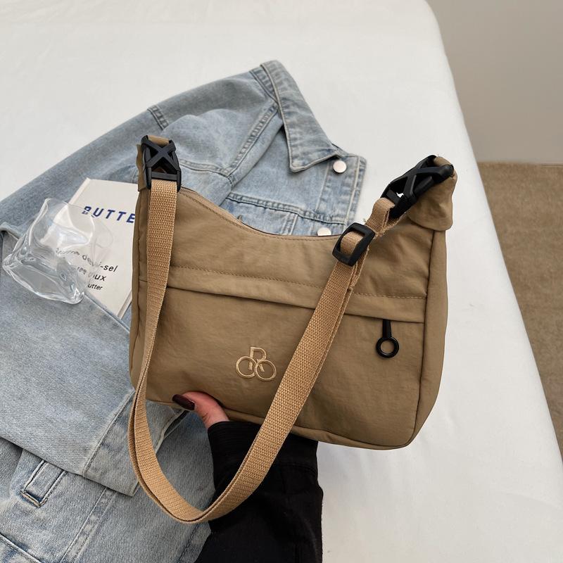 Spring new trendy niche design casual 2025 portable fashion shoulder crossbody pillow bag commuter women's bag