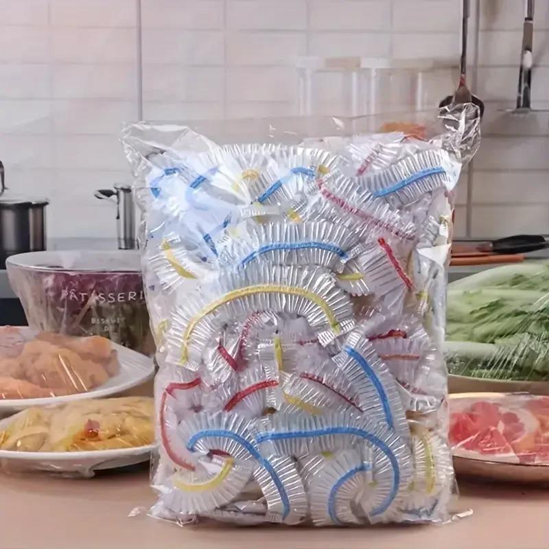 500/100 Stück Einweg-Lebensmittelabdeckung Obst-Lebensmittelabdeckung Elastische Plastik-Duschhaube Lebensmittelqualität Aufbewahrungsbeutel Küchenorganisator Frischhaltefolie Colorful 100pcs
