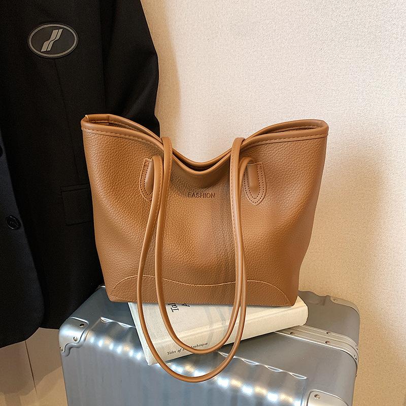 Popular retro bag women's large capacity 2025 new spring casual messenger bag portable bucket bag