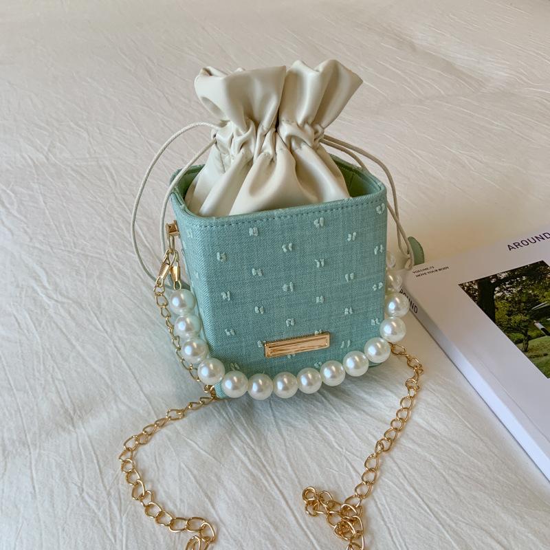 New niche bucket bag trendy personalized high-end messenger bag simple atmosphere pearl portable women's bag