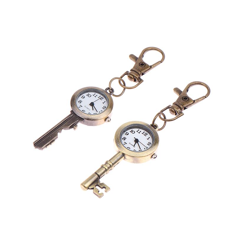 Niedliche schöne Taschenuhr im Markenstil mit Schlüsselanhänger und Kette aus Quarz