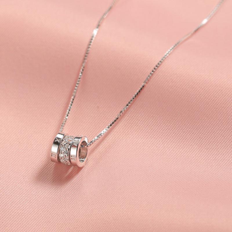 Women s Summer Circle Necklace: Roman Numeral Three-Ring, Lucky Bead Pendant, Minimalist Clavicle Chain Design.