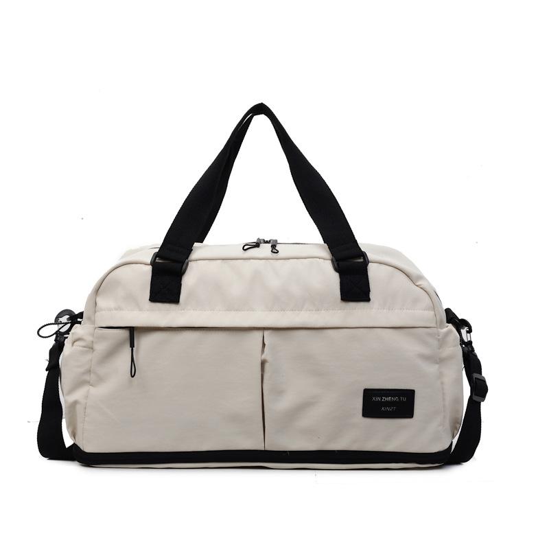 

Stylish large-capacity short-distance travel bag Korean version of lightweight yoga fitness bag outdoor travel expandable storage bag off білий колір
