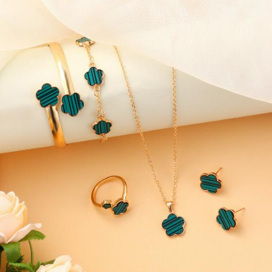 Lucky Flower Jewelry Set: Acrylic Bracelet, Five-Leaf Clover Necklace, Ring, and Earrings for Women.
