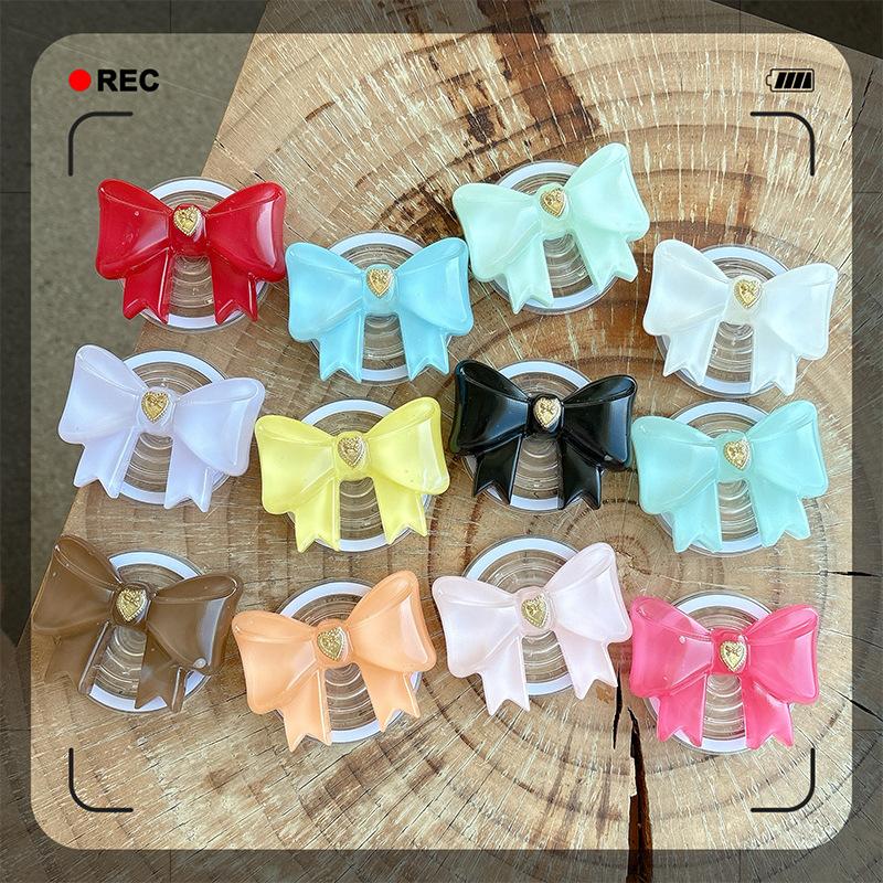 Small Love Three-Dimensional Bow Mobile Phone Airbag Bracket Magnetic Suction Telescopic Folding Desktop Bracket Wind