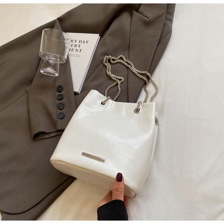 

Large capacity bucket underarm bag women s 2025 new fashion chain solid color shoulder bag soft side versatile tote bag