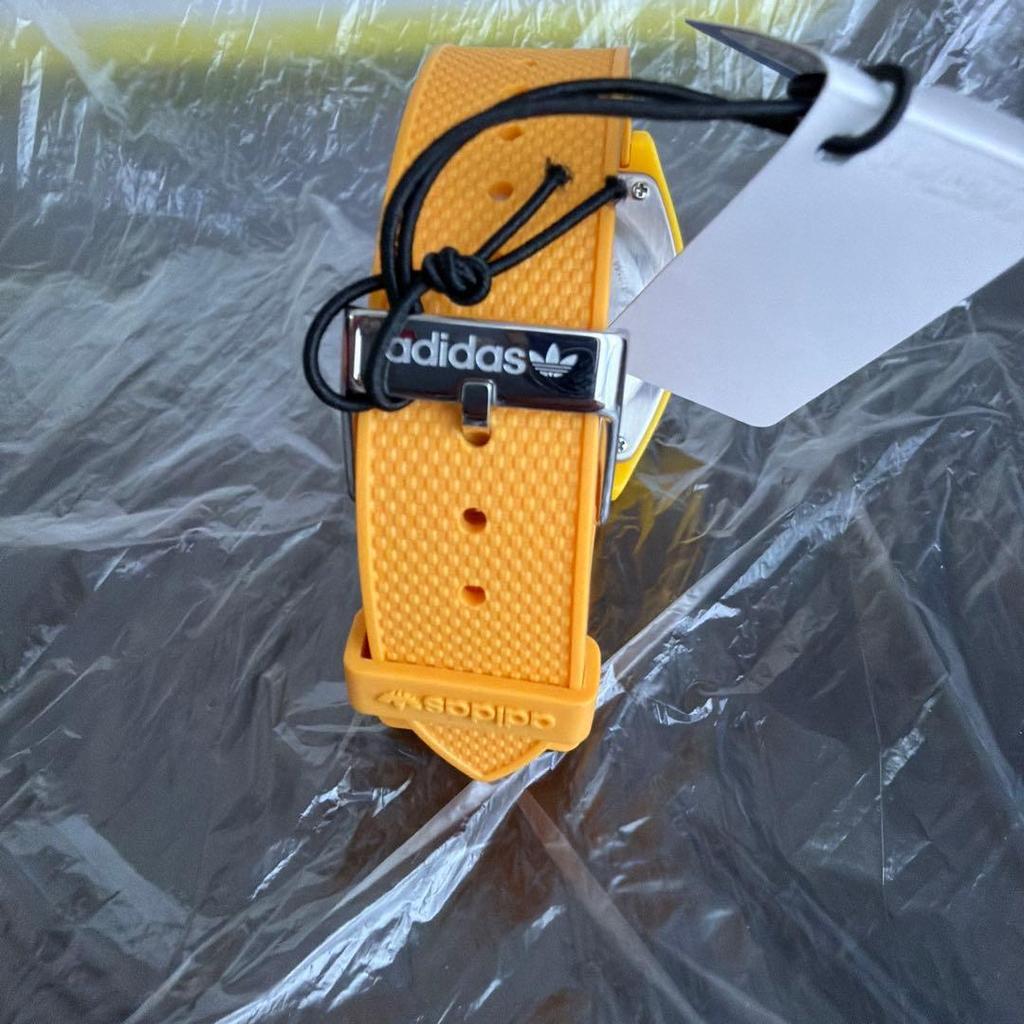 Used adidas watch yellow