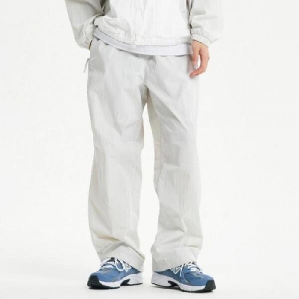 

New Balance Uni Flying 2 Way Warm Up Pants Nbnte12313 16 light gray/85