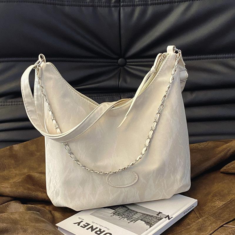 

Simple and fashionable large-capacity commuter tote bag 2024 summer new foreign style shoulder bag simple and fashionable commuter bag Without pendant бежевий
