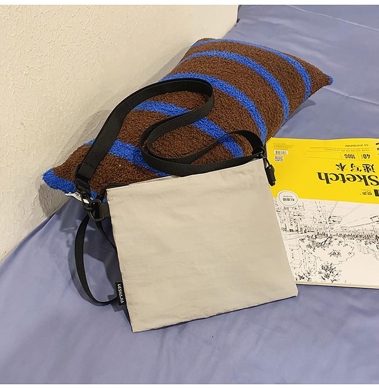 Brand new versatile envelope bag personalized outdoor handbag fashion tooling small satchel bag casual mobile phone bag