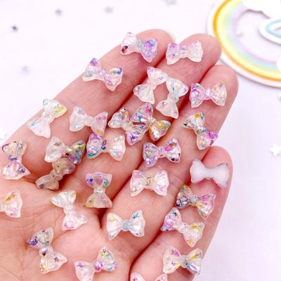 50 Stück Kunstharz, bunt, Comic-Schmetterling, Schleife, Kristall-Edelstein, flache Rückseite, Strass-Applikation, DIY, Hochzeit, Sammelalbum für Nägel, Basteln