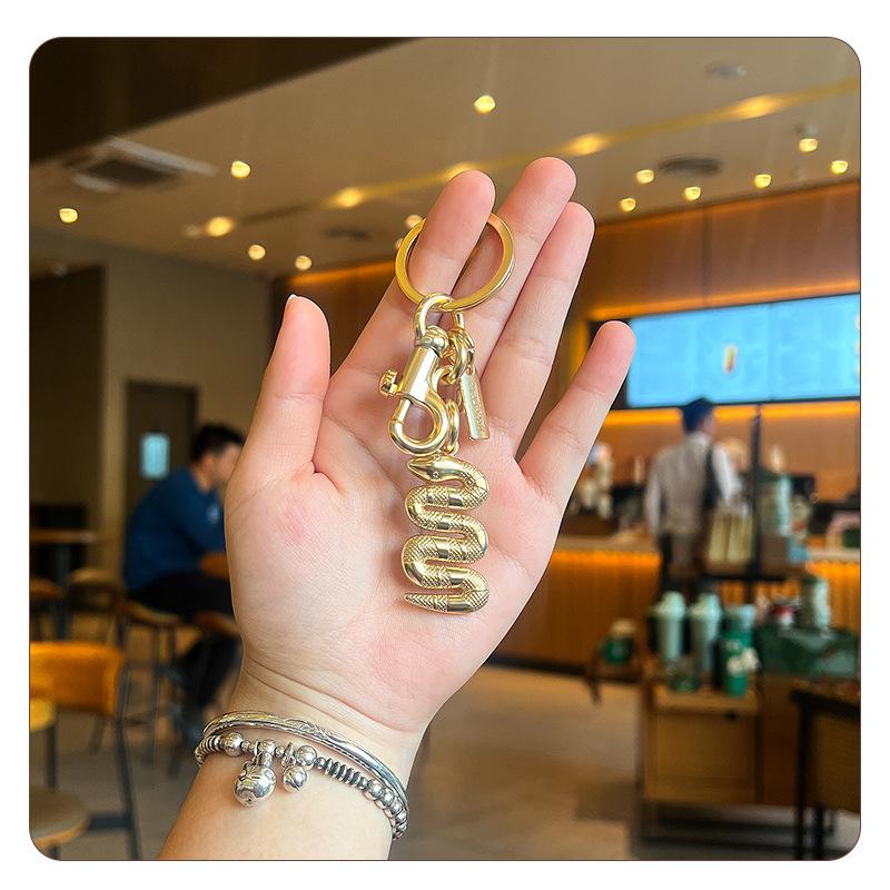 

IGNICASE New Creative Keychain Pendant Super Fire Exquisite Men s and Women s Couples Bag Pendant Hand Rope Luggage Accessories