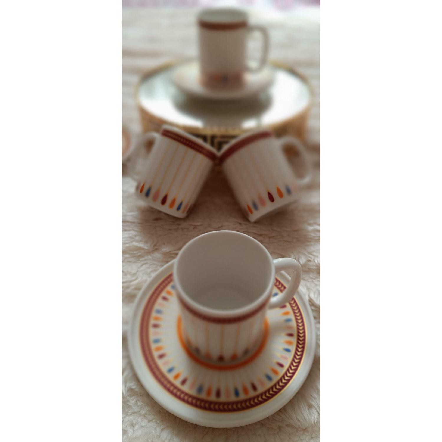 

Набор фарфоровых кофейных чашек Orange Whirling Dervish на 6 персон чистый