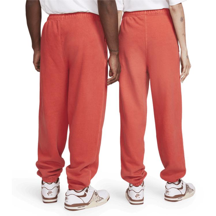Stussy x Nike Bawełniane Spodnie Dresowe z Pigmentowym Barwieniem Habanero Red Unisex Streetwear FJ9157-642