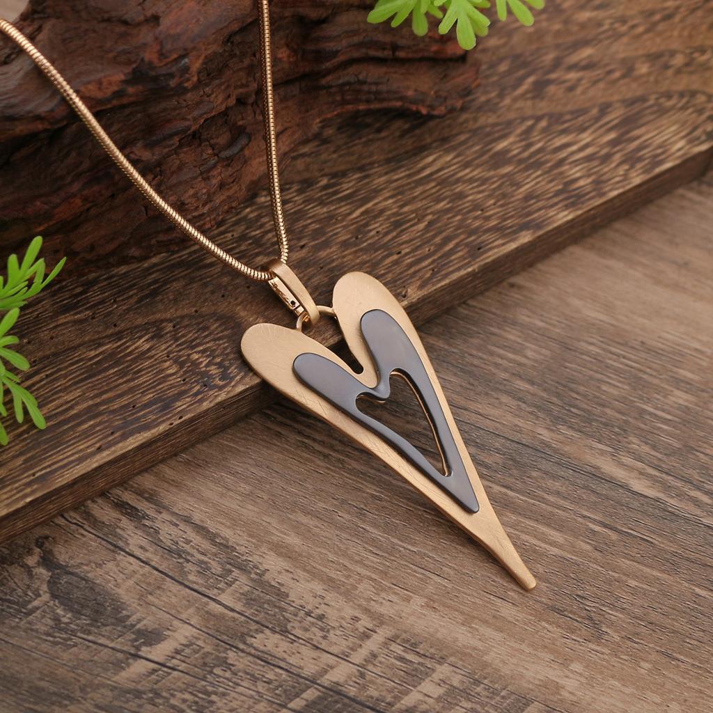 Hollow geometric flower love long necklace, women's exaggerated high-end irregular brushed pendant