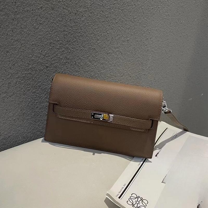 New lychee pattern leather half cover hand grab bag genuine leather women's bag single shoulder underarm bag oblique span bag wholesale