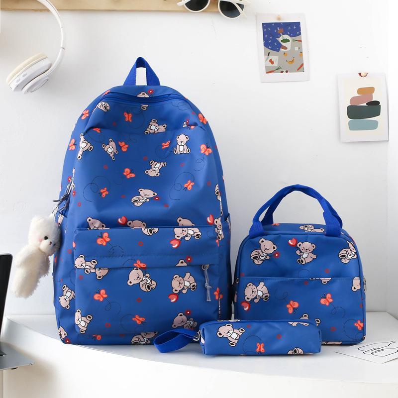 School bag new cute cartoon nylon backpack women's large-capacity middle and high school burden reduction wear-resistant school bag three-piece set
