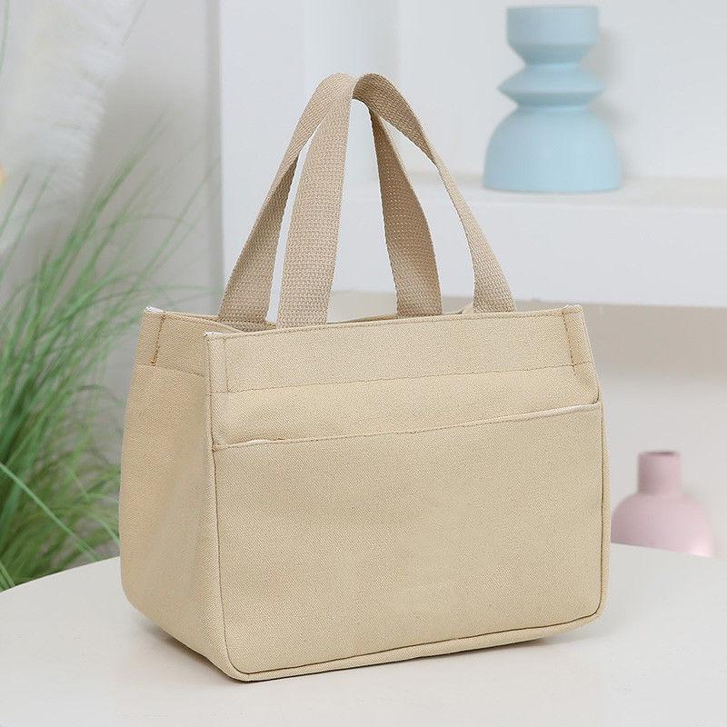 

Versatile Large Capacity Canvas Tote Bag for Office, Students, Lunch, and Mommy Needs