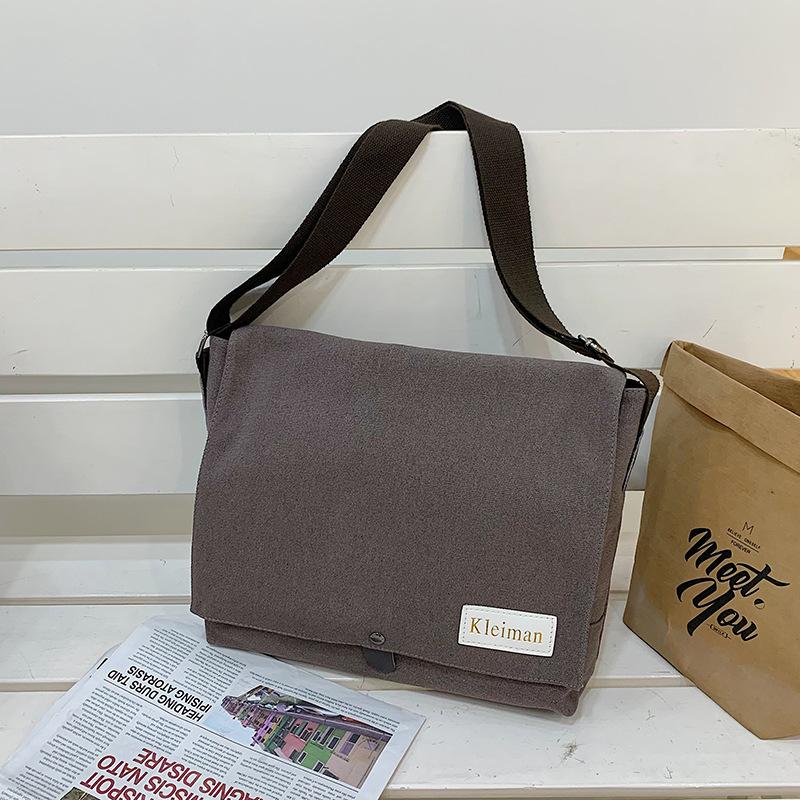 Niche design simple canvas bag men's new versatile casual shoulder bag going oblique span bag