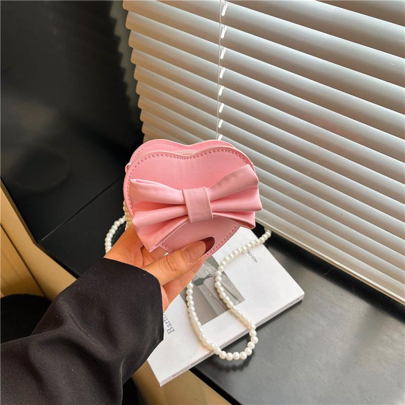 Summer new Korean version heart-shaped bow women's bag small bag foreign style shoulder bag solid color small bag messenger bag women