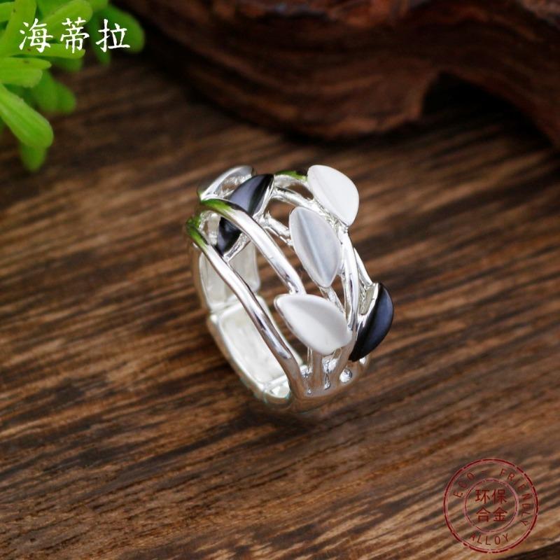 New Enamel Color Hollow Geometric Petal Elastic Ring Women's Simple High-end Flower Versatile Ring