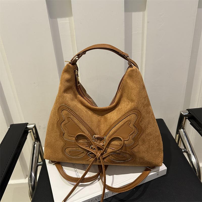 

Large capacity bow backpack 2025 autumn and winter new retro shoulder bag premium texture commuter tote women s bag