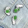Fashion Cartoon Brooches Hand Holding Green Tea Bag Cup Leaf Enamel Pins for Women Men Custom Charm Jewelry Bag Denim Badge Gift