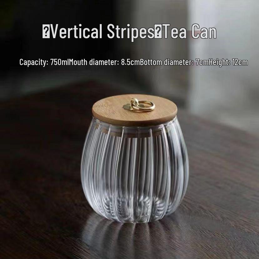 

Стеклянная банка в форме лепестка с полосками для закусок, чая, меда, кофейных зерен и многого другого.