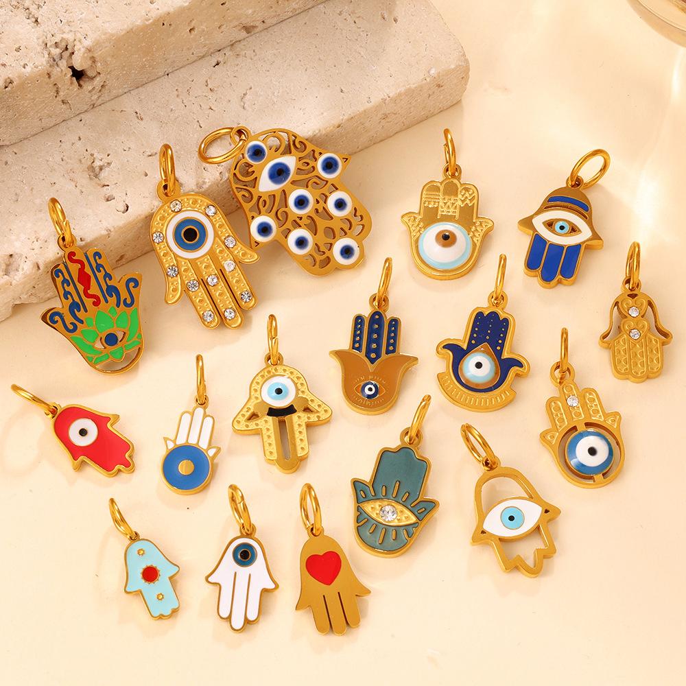 European and American retro exotic jewelry pendant golden Fatima hand evil eye element decorative pendant